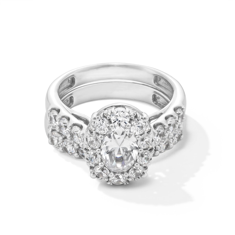 Main Image 1 of 2-3/4 CT. T.W. Oval Diamond Frame Bridal Set in 14K White Gold