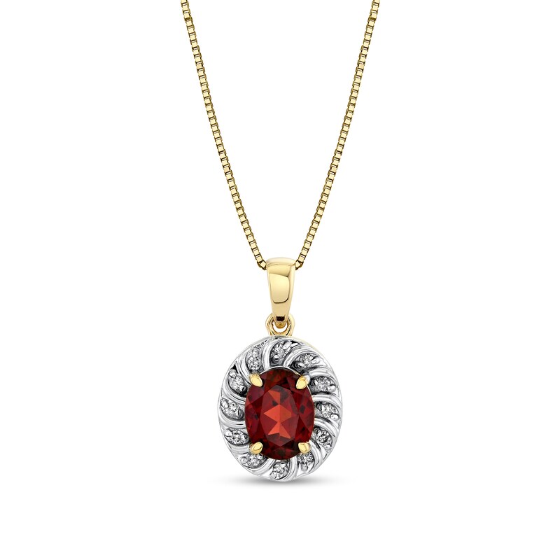 Main Image 1 of Oval Garnet and 1/8 CT. T.W. Diamond Swirl Frame Pendant in 10K Gold