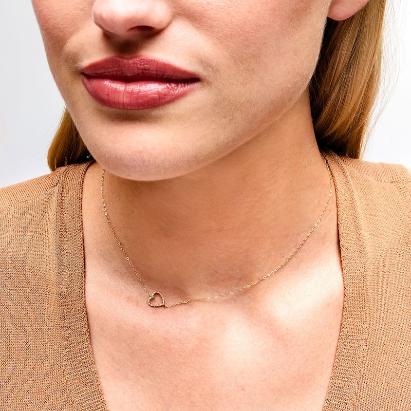 Main Image 2 of 1/20 CT. T.W. Diamond Sideways Heart Necklace in 10K Gold - 16"