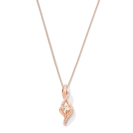 5.0mm Heart-Shaped Morganite and 1/20 CT. T.W. Diamond Twist Drop Pendant in 10K Rose Gold