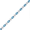 Thumbnail Image 2 of Oval Swiss Blue Topaz, White Lab-Created Sapphire and Diamond Accent Link Bracelet in Sterling Silver - 7.25”