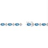 Thumbnail Image 3 of Oval Swiss Blue Topaz, White Lab-Created Sapphire and Diamond Accent Link Bracelet in Sterling Silver - 7.25”