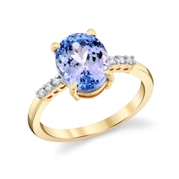 Oval Tanzanite and 1/15 CT. T.W. Diamond Ring in 10K Gold