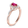 Thumbnail Image 2 of Oval Lab-Created Ruby and 1/8 CT. T.W. Diamond Frame Twist Shank Ring in Sterling Silver with 14K Gold Plate - Size 7