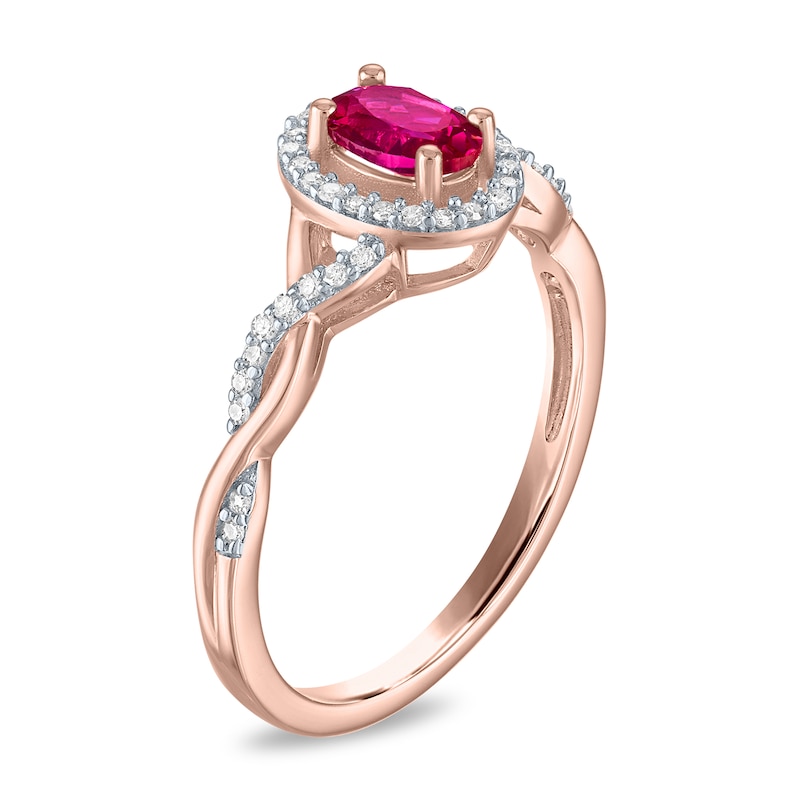 Main Image 2 of Oval Lab-Created Ruby and 1/8 CT. T.W. Diamond Frame Twist Shank Ring in Sterling Silver with 14K Gold Plate - Size 7