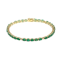 Oval Emerald and 1/15 CT. T.W. Diamond Link Bracelet in 10K Gold - 7.25"