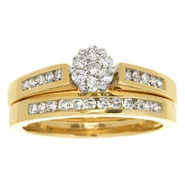 Previously Owned - 1/2 CT. T.W. Multi-Diamond Flower Soldered Bridal Set in 10K Gold