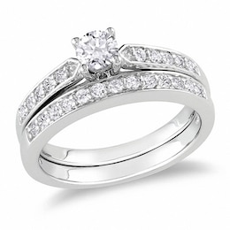Previously Owned - 1/2 CT. T.W. Diamond Soldered Bridal Set in Sterling Silver