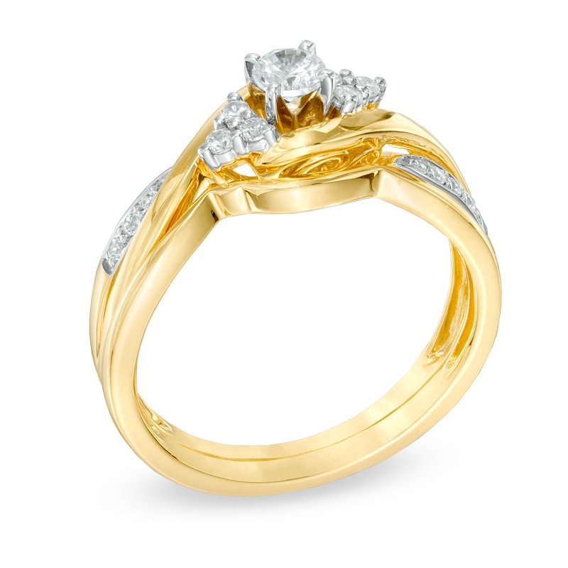 Main Image 2 of Previously Owned - 1/3 CT. T.W. Diamond Twist Shank Soldered Bridal Set in 10K Gold
