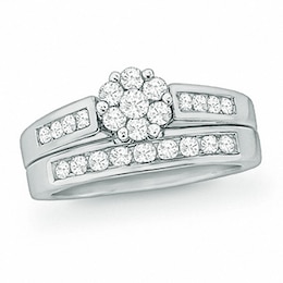 Previously Owned - 1/2 CT. T.W. Multi-Diamond Flower Soldered Bridal Set in 10K White Gold