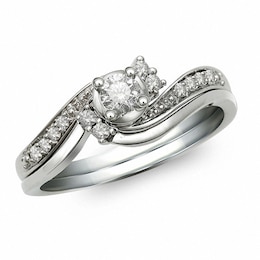 Previously Owned - 1/4 CT. T.W. Diamond Soldered Bridal Set in 10K White Gold