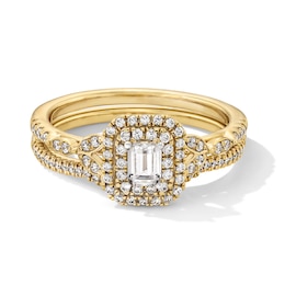 5/8 CT. T.W. Emerald-Cut Diamond Frame Bridal Set in 14K Gold (I/SI2)