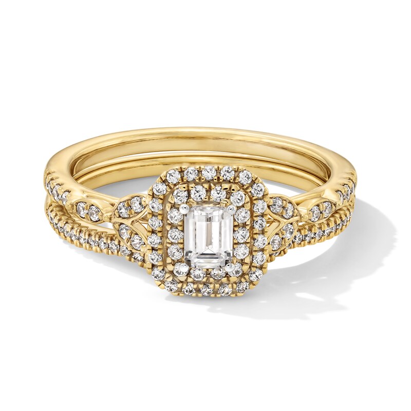 Main Image 1 of 5/8 CT. T.W. Emerald-Cut Diamond Frame Bridal Set in 14K Gold (I/SI2)