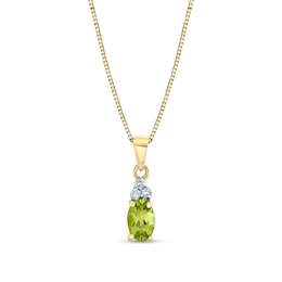 Oval Peridot and 1/20 CT. T.W. Diamond Necklace in 14K Gold