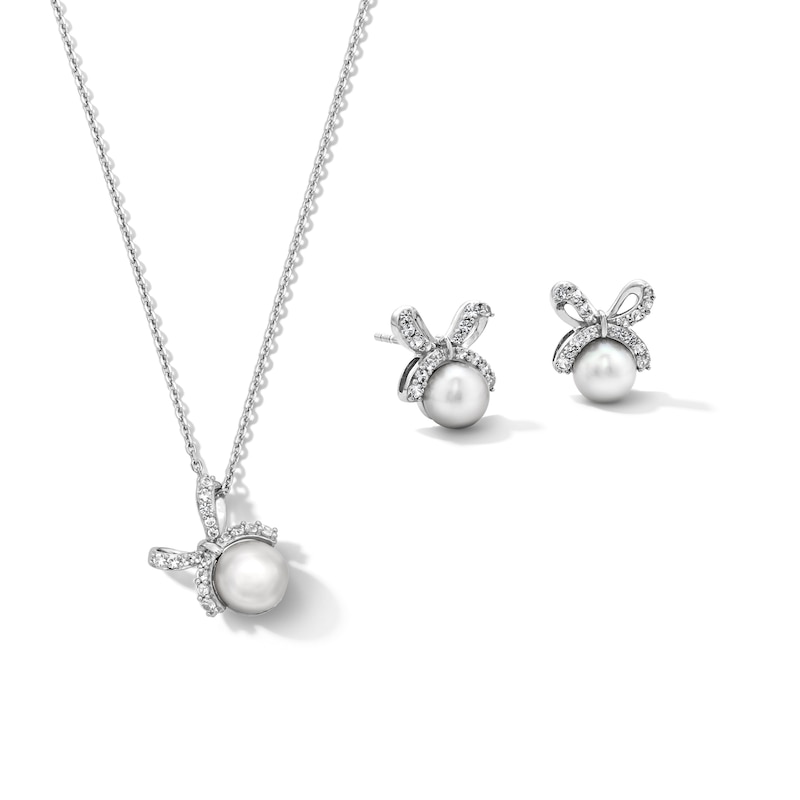 Main Image 1 of 6.0–7.0mm Freshwater Cultured Pearl and White Lab-Created Sapphire Bow Pendant and Stud Earrings Set in Sterling Silver