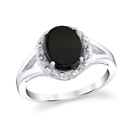Oval Black Onyx and 1/10 CT. T.W. Diamond Frame Fashion Ring in Sterling Silver
