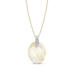 Oval Citrine and 1/20 CT. T.W. Diamond Pendant in 14K Gold