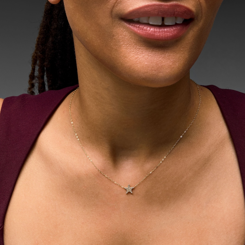 Main Image 2 of 1/20 CT. T.W. Diamond Star Necklace in 10K Gold - 16.0"