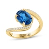 Thumbnail Image 1 of EFFY™ Oval London Blue Topaz and 1/8 CT. T.W. Diamond Bypass Ring in 14K Gold