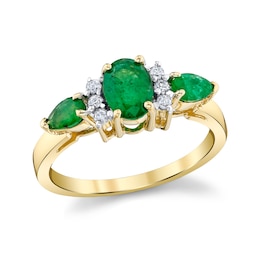 Oval and Pear-Shaped Emerald and 1/8 CT. T.W. Diamond Three-Stone Ring in 14K Gold