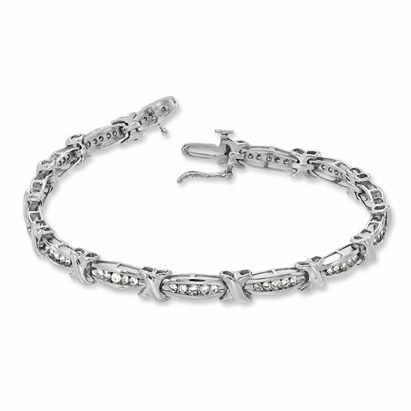 Main Image 2 of Previously Owned - 1 CT. T.W. Diamond Channel "X" Link Bracelet in 10K White Gold