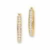 Previously Owned - 1/4 CT. T.W. Channel-Set Diamond Oval Hoop Earrings in 14K Gold