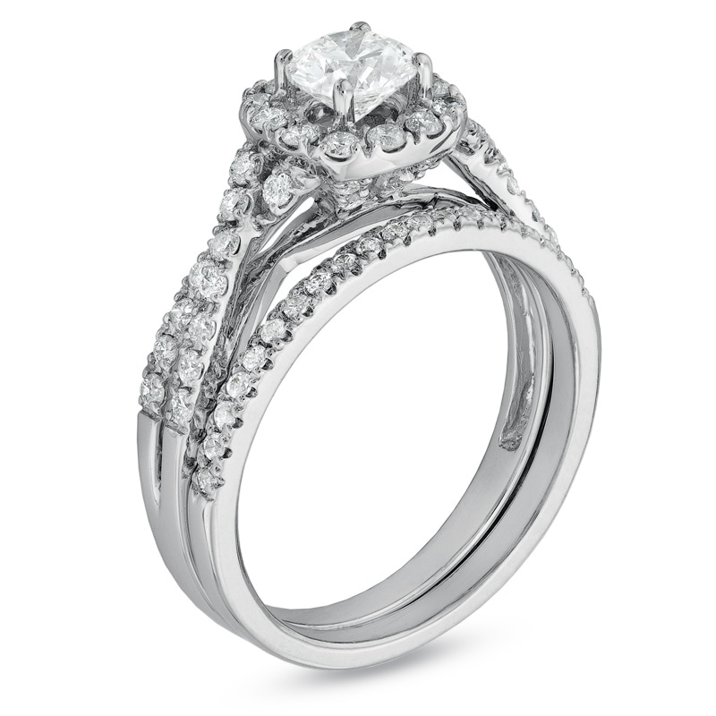 Previously Owned - 1-1/10 CT. T.W. Diamond Frame Twist Bridal Set in 14K White Gold