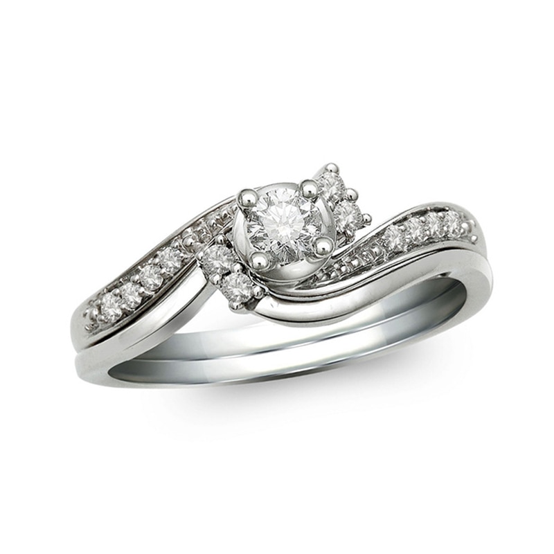 Main Image 1 of Previously Owned - 1/4 CT. T.W. Diamond Bypass Bridal Set in 10K White Gold