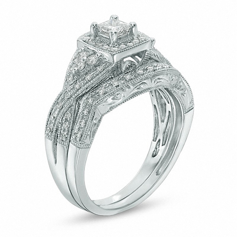 Previously Owned - 1/2 CT. T.W. Princess-Cut Diamond Twist Bridal Set in 14K White Gold