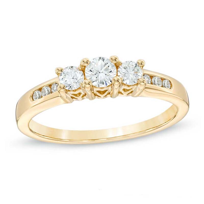 Main Image 1 of Previously Owned - 1/2 CT. T.W. Diamond Past Present Future® Ring in 14K Gold