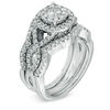 Thumbnail Image 1 of Previously Owned - 1-1/4 CT. T.W. Diamond Cluster Bridal Set in 14K White Gold