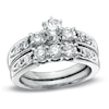 Previously Owned - 1-1/2 CT. T.W. Diamond Three Stone Bridal Set in 14K White Gold