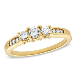Previously Owned - 1/2 CT. T.W. Diamond Past Present Future® Ring in 14K Gold