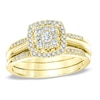 Thumbnail Image 1 of Previously Owned - 1/2 CT. T.W. Diamond Cluster Frame Three Piece Bridal Set in 10K Gold