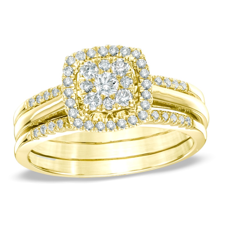 Main Image 1 of Previously Owned - 1/2 CT. T.W. Diamond Cluster Frame Three Piece Bridal Set in 10K Gold