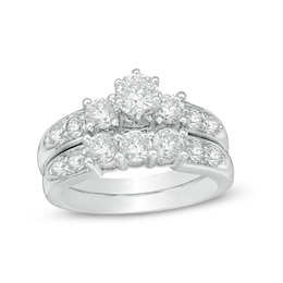 Previously Owned - 2 CT. T.W. Diamond Three Stone Bridal Set in 14K White Gold