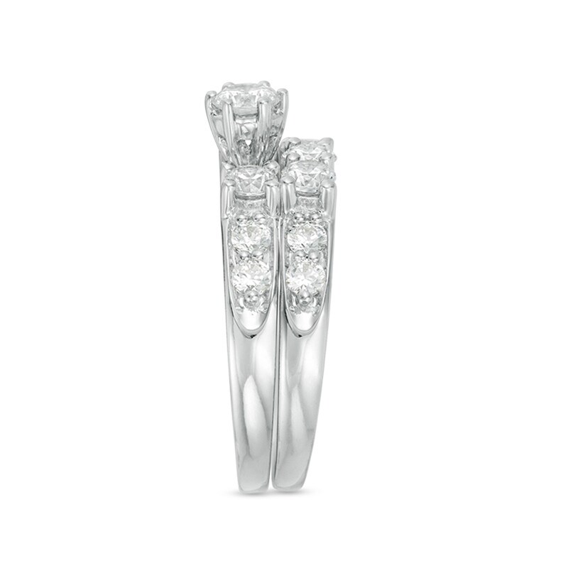 Previously Owned - 2 CT. T.W. Diamond Three Stone Bridal Set in 14K White Gold