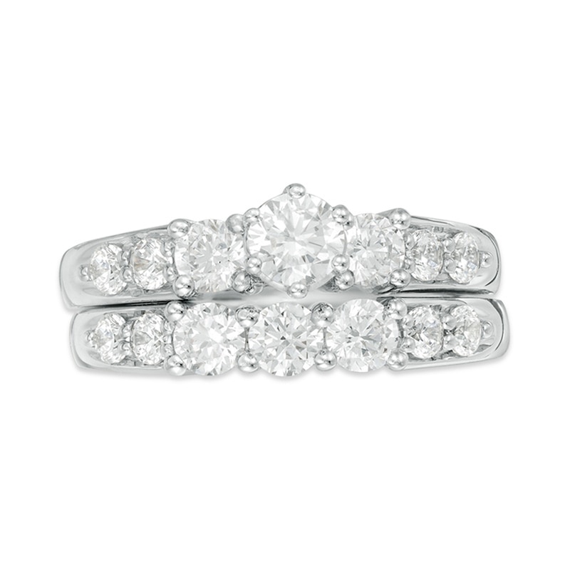 Previously Owned - 2 CT. T.W. Diamond Three Stone Bridal Set in 14K White Gold