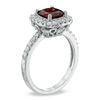 Thumbnail Image 1 of Previously Owned - 7.0mm Cushion-Cut Garnet and Lab-Created White Sapphire Frame Ring in Sterling Silver