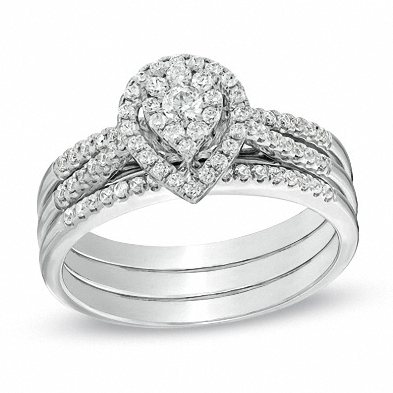 Main Image 1 of Previously Owned - 1/2 CT. T.W. Diamond Cluster Pear-Shaped Frame Three Piece Bridal Set in 10K White Gold