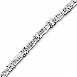 Previously Owned - 1 CT. T.W. Diamond Channel &quot;X&quot; Bracelet in 10K White Gold