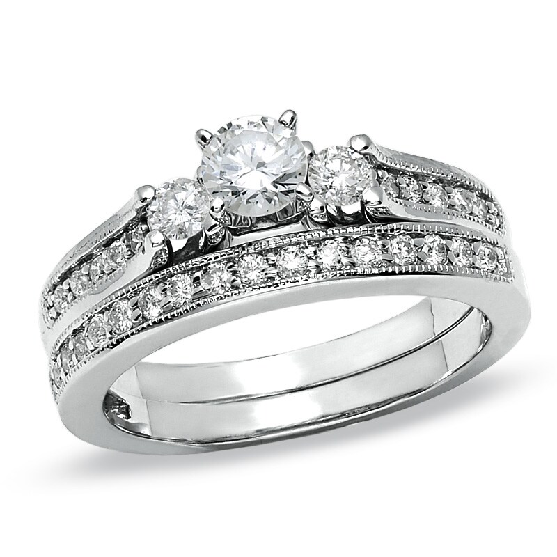 Previously Owned - 3/4 CT. T.W. Diamond Three Stone Bridal Set in 14K White Gold
