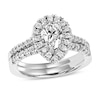 Thumbnail Image 1 of Previously Owned - 3/4 CT. T.W. Pear-Shaped Diamond Frame Bridal Set in 14K White Gold