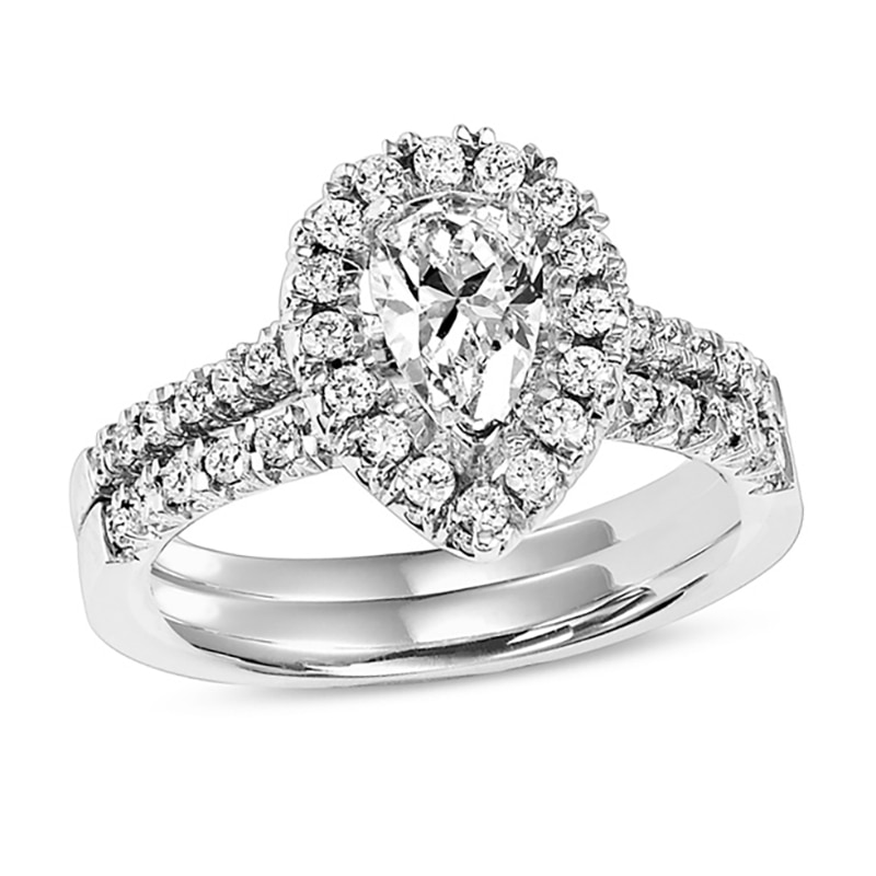 Main Image 1 of Previously Owned - 3/4 CT. T.W. Pear-Shaped Diamond Frame Bridal Set in 14K White Gold