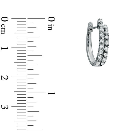 Previously Owned - 1/5 CT. T.W. Diamond Double Row Hoop Earrings in 10K White Gold Previously Owned - 1/5 CT. T.W. Diamond Double Row Hoop Earrings in 10K White Gold