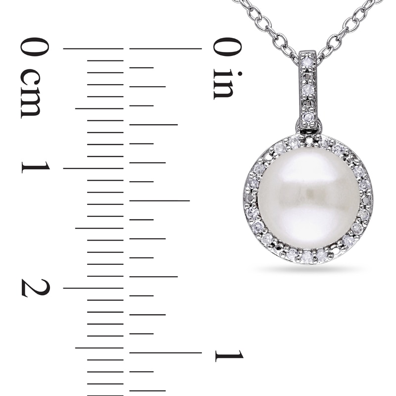 Previously Owned - 8.0 - 8.5mm Button Cultured Freshwater Pearl and 1/10 CT. T.W. Diamond Frame Pendant