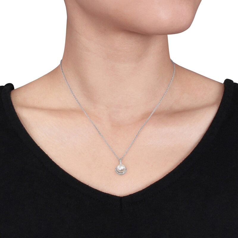 Previously Owned - 8.0 - 8.5mm Button Cultured Freshwater Pearl and 1/10 CT. T.W. Diamond Frame Pendant