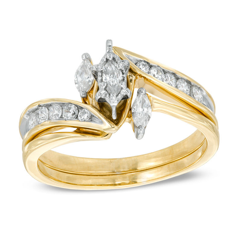 Previously Owned - 1/2 CT. T.W. Marquise Diamond Three Stone Slant Bridal Set in 10K Gold