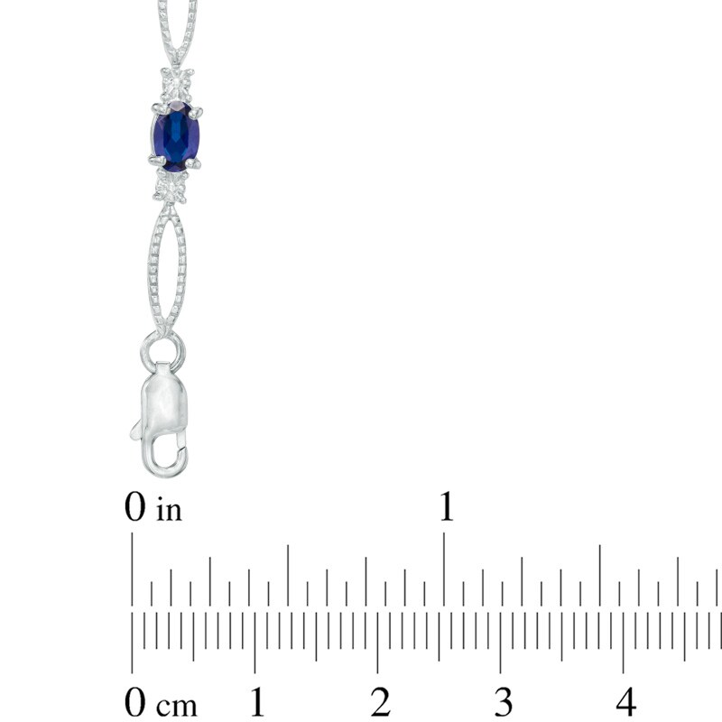Main Image 2 of Previously Owned - Oval Lab-Created Blue Sapphire and Diamond Accent Bracelet in Sterling Silver - 7.25"