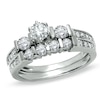 Previously Owned - 1 CT. T.W. Diamond Three Stone Bridal Set in 14K White Gold
